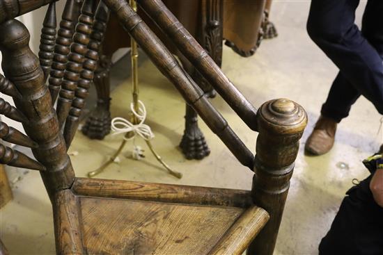 A 19th century turners chair, with triangular seat and ball-turned spars to back